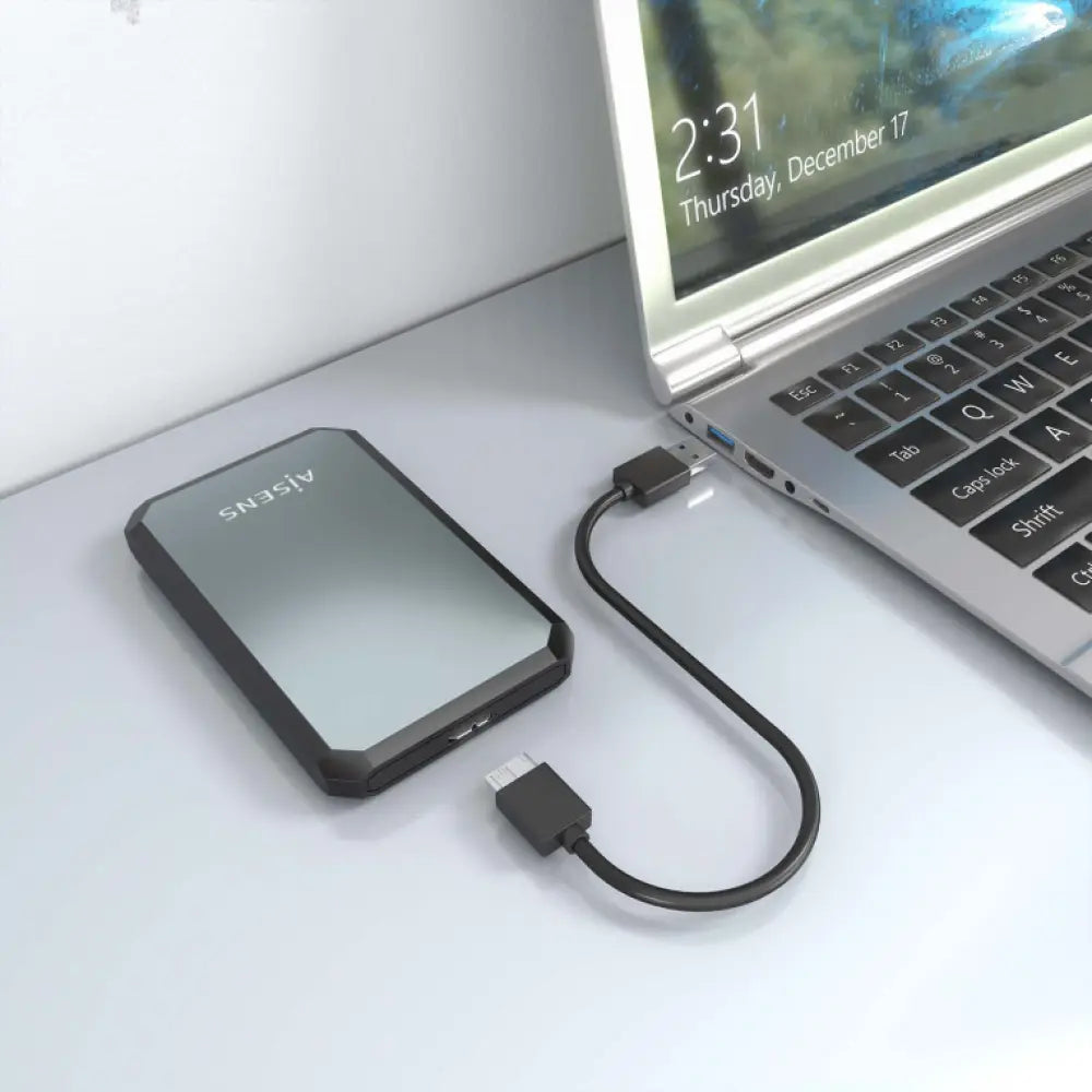 Carcasa negra y gris para disco duro externo o SSD de 2.5 pulgadas de la marca AISENS, resistente y fácil de instalar.