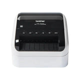 Impresora térmica Brother QL-1110NWB para etiquetas, vista frontal con bandeja de papel y panel de control.