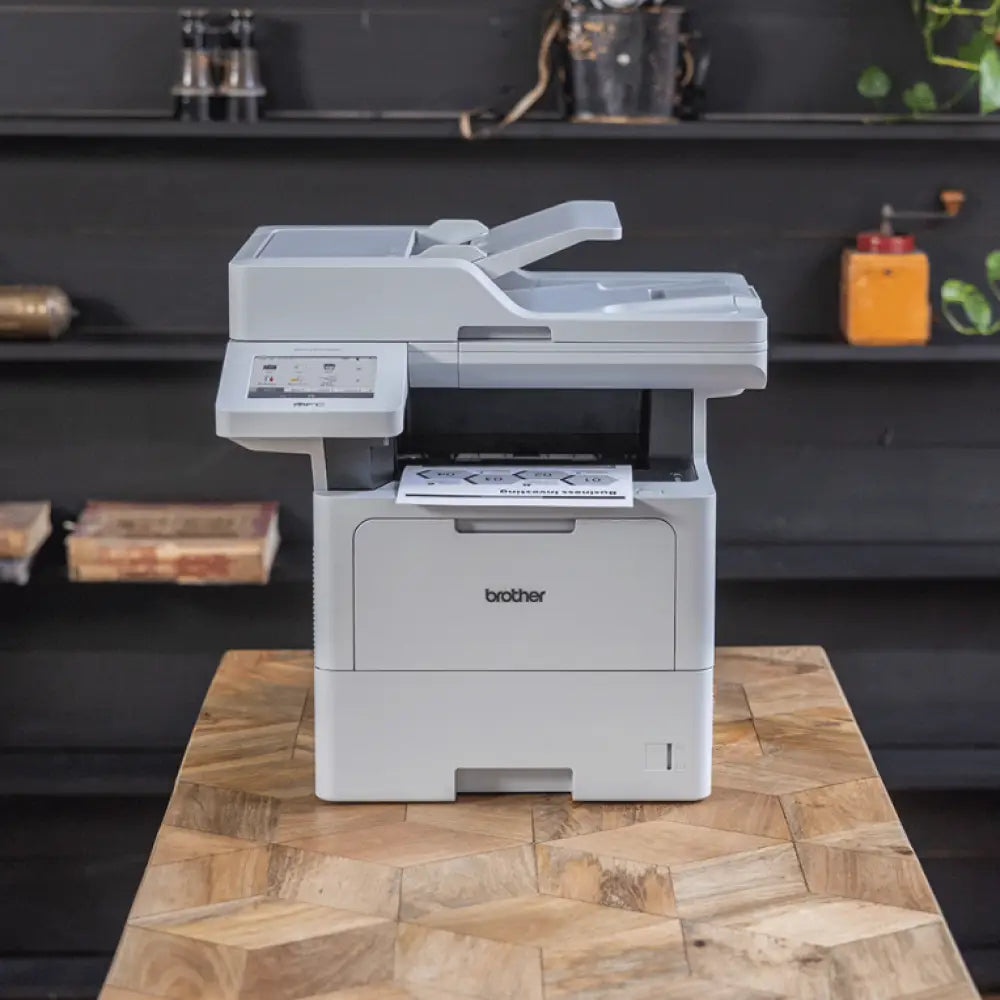 Impresora multifunción Brother MFC-L6710DW láser A4 con capacidad WiFi, pantalla y bandeja de papel, alta velocidad de 50 ppm.