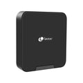 Convertidor de Smart TV Leotec Android TV Box 4K SHOW 2 con puerto USB y cables, en color negro, vista frontal.