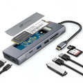 Estación de acoplamiento Leotec 8 en 1 con ranura M.2 para SSD, puerto USB, HDMI y otros puertos en caja externa.