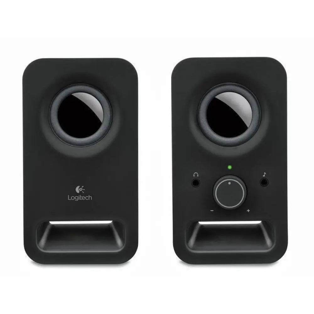 Altavoces Logitech 2.0 Z150 negros en escritorio, con controles de volumen y conexión de audio para sonido claro y potente.