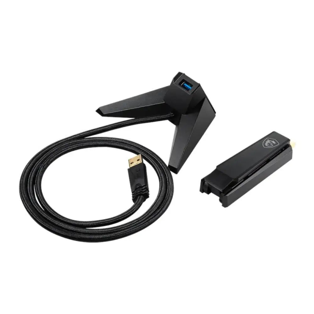 Adaptador USB WiFi 6 MSI GUAX18 AX1800 inalámbrico en color rojo, con antena y puerto USB para conexión rápida.