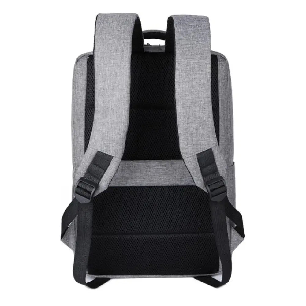 Mochila profesional NILOX gris para portátil de 15.6 pulgadas, bolsa de transporte con múltiples compartimentos y correa ajustable.
