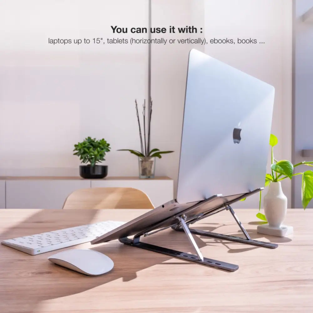 Soporte elevador gris de TOOQ para portátiles, tablets, móviles y libros, con diseño ergonómico y compacto para uso diario.