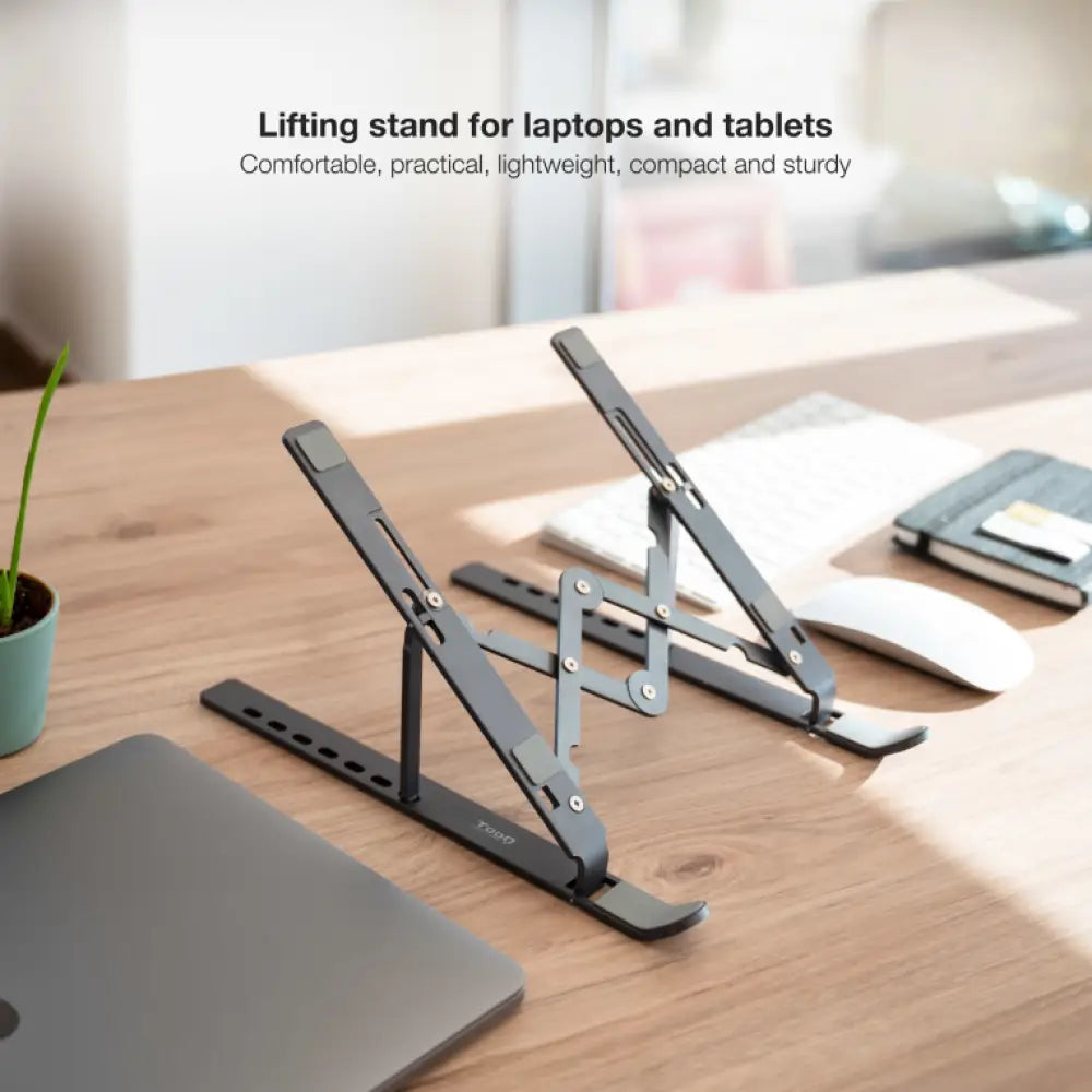 Soporte elevador gris TOOQ para portátiles, tablets, móviles y libros, con superficie antideslizante y diseño compacto.