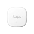 Sensor de temperatura y humedad TP-Link Tapo T310 inalámbrico, con pantalla y batería, para monitoreo interior de condiciones ambientales.